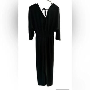 Bebop women’s hunter green pantsuit with tie in back. Size large